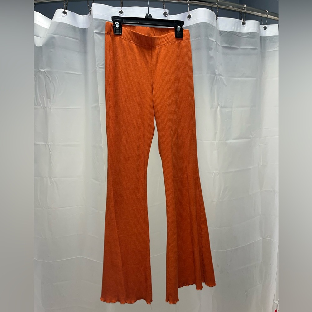 flare-leg “burnt orange” pants